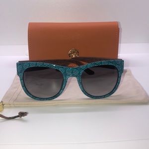 Teal Tory Burch wayfarer sunglasses.